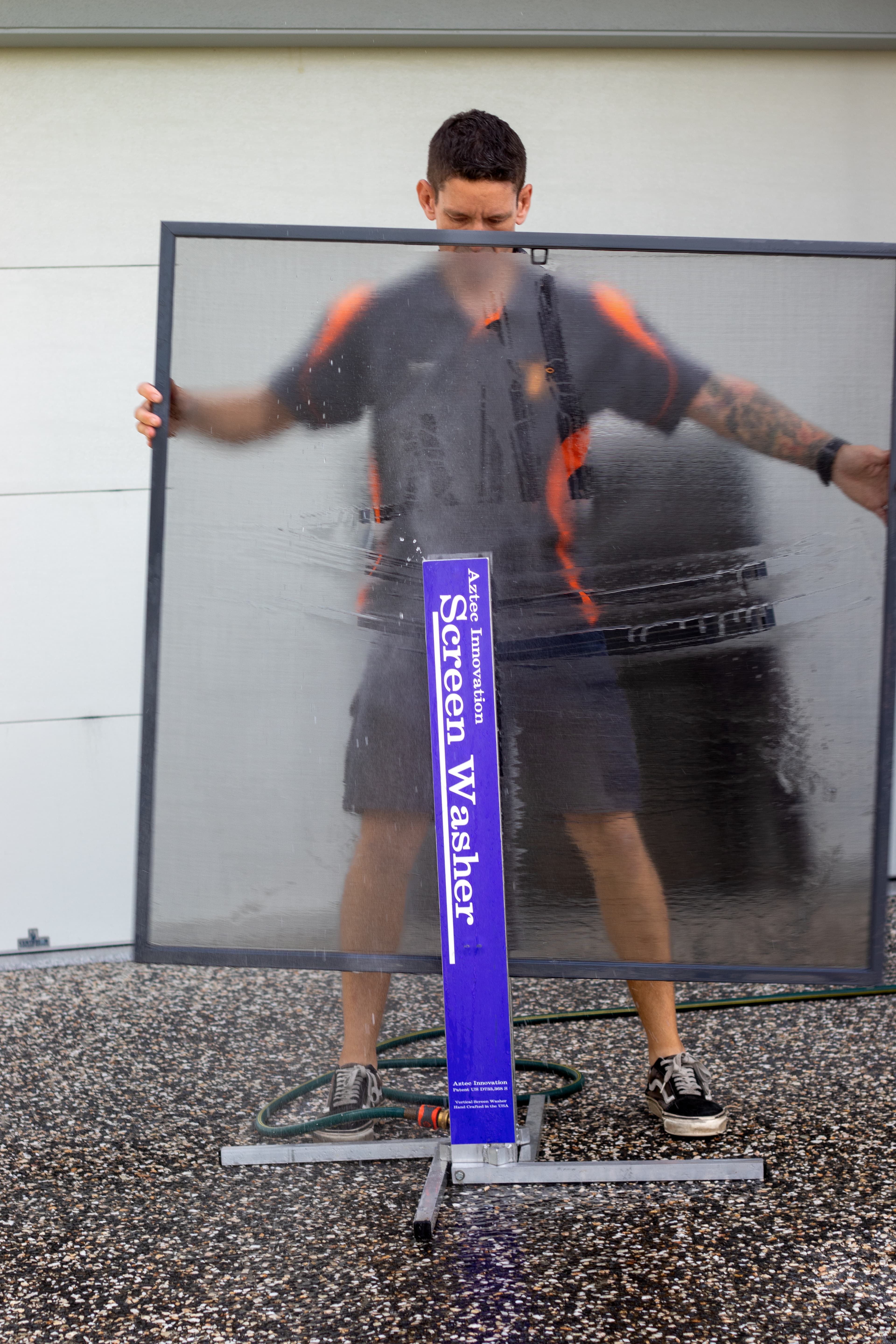 Fly screen cleaning machine in action