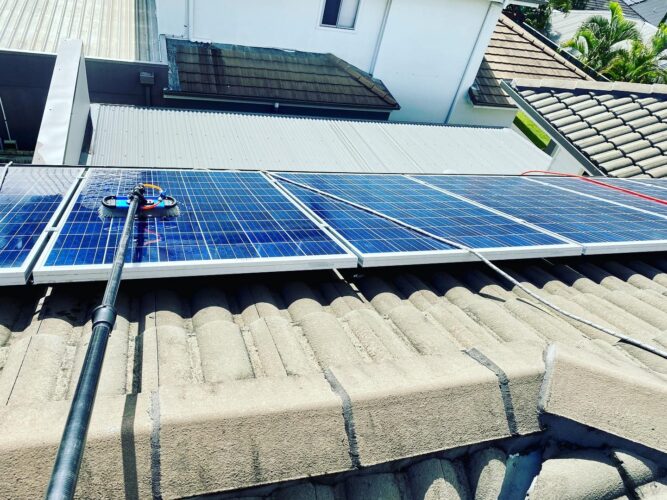 Solar panel cleaning with water fed pole
